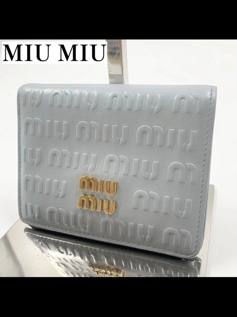 Miu Miu Light Blue Embossed Logo Compact Wallet with Gold Hardware